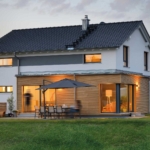 Außen Haus Grauer Holzhaus WEISS