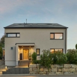 Gartenansicht Haus Seyfried Holzhaus WEISS