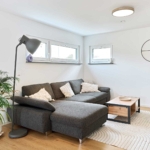 Wohnzimmer Haus Bitz von Fertighaus WEISS