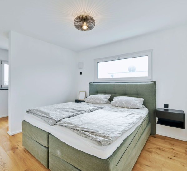 Schlafzimmer Haus Troglia von Fertighaus WEISS